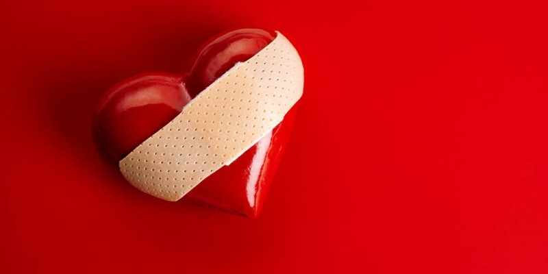 Broken heart shape with bandage 