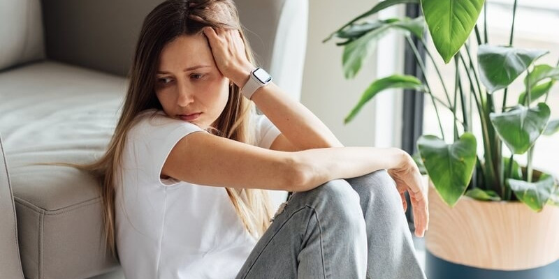 Unhappy young caucasian woman having relationship anxiety