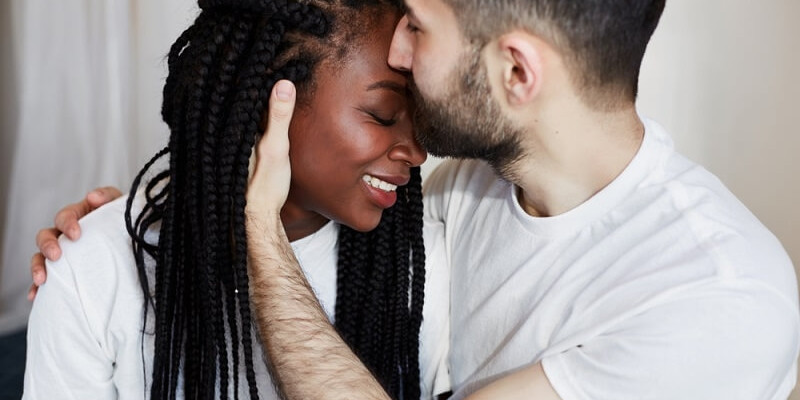 black girl and white man hugging in Interracial Relationships