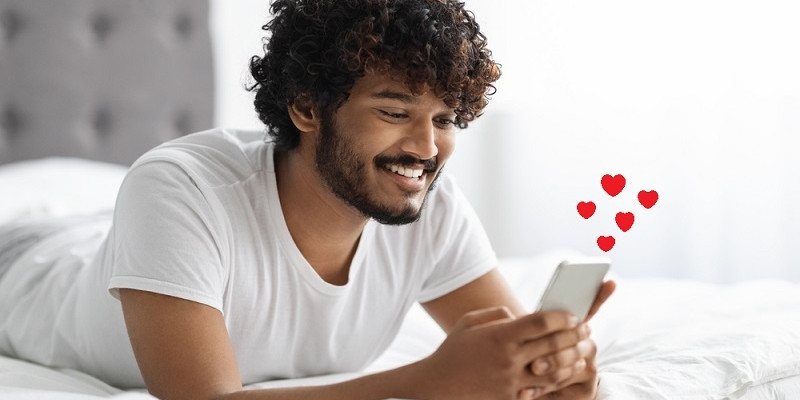 Man chatting with his girlfriend after waking up in the morning